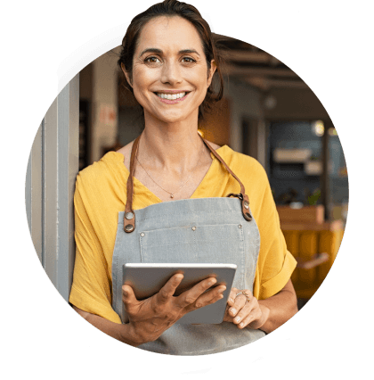 Mulher comerciante segurando um tablet